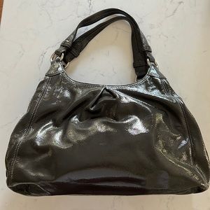 Coach dark gray patent leather satchel.